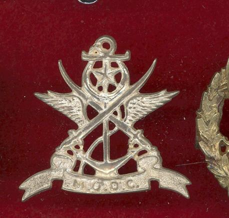 Pakistan Army M.O.D.C. head-dress badge