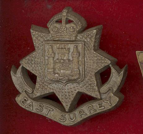 East Surrey Regiment WW2 plastic economy cap badge.