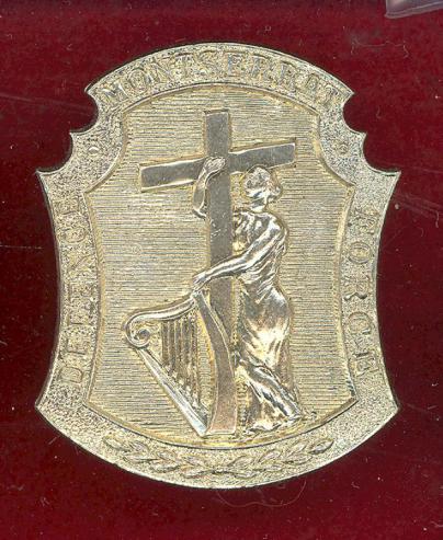 Montserrat Defence Force cap badge