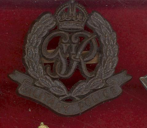 Military Police WW2 plastic economy cap badge 