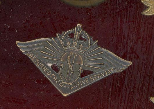 Australian Navy Returned From Active Service lapel / collar badge