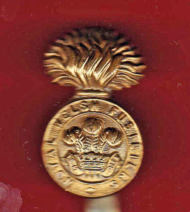 Royal Welch Fusiliers WW1 economy cap badge