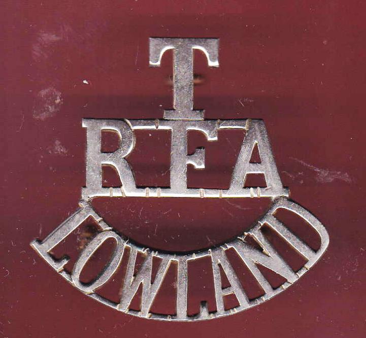 T / RFA / LOWLAND pre WW1 white metal shoulder title