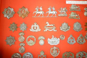 Collection of 83 WW2 Infantry plastic economy badges