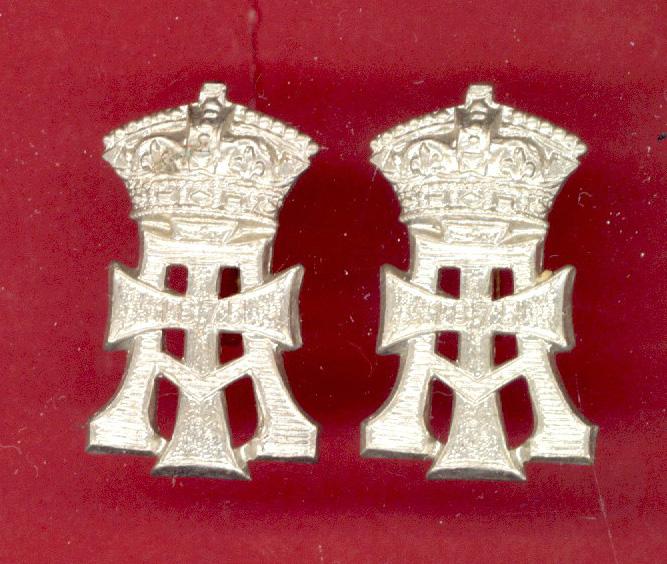 The Green Howards OR's collar badges