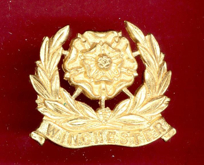 Winchester College O.T.C. gilt cap badge