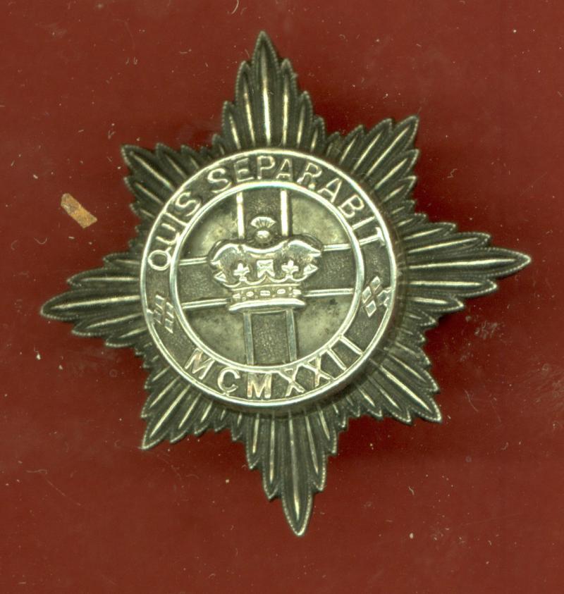 4th/7th Royal Dragoon Guards Officer's silver cap badge.