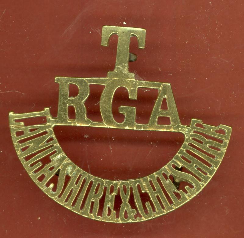 T / RGA / LANCASHIRE & CHESHIRE brass Royal Garrison Artillery shoulder title