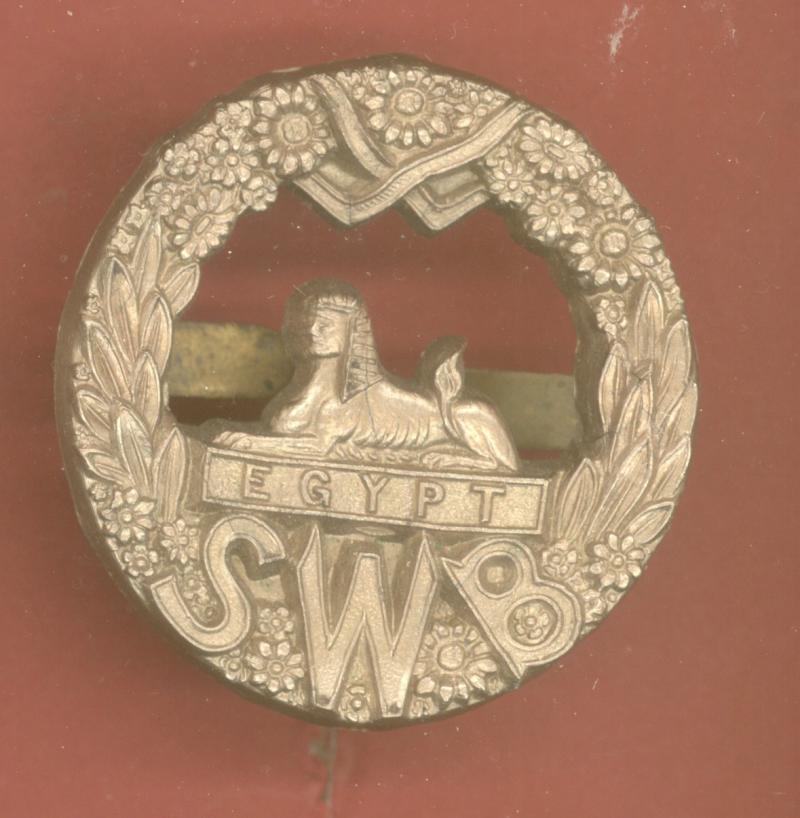 South Wales Borderers WW2 plastic economy cap badge