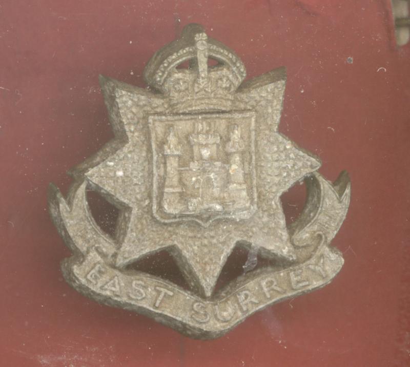 East Surrey Regiment WW2 plastic economy cap badge.